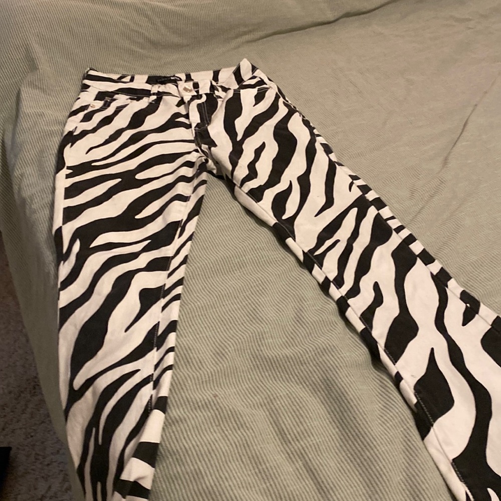 Fashion nova flare zebra print jeans